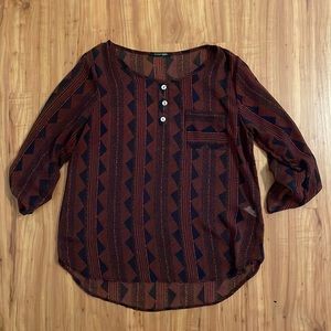 Shear blouse with button detail